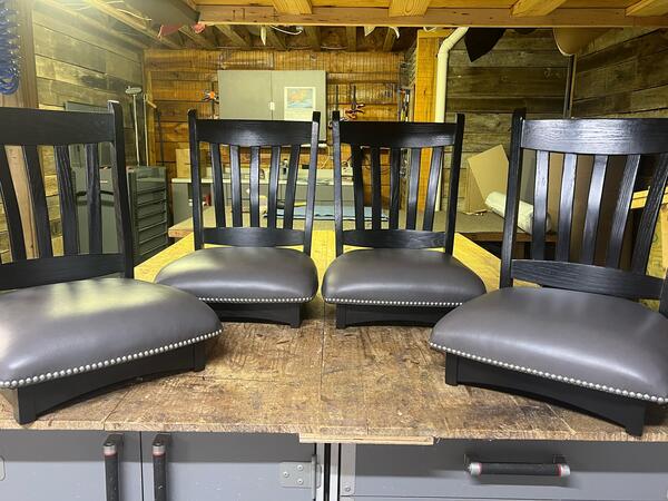 After: Four nice wooden dining chairs with new leather seats