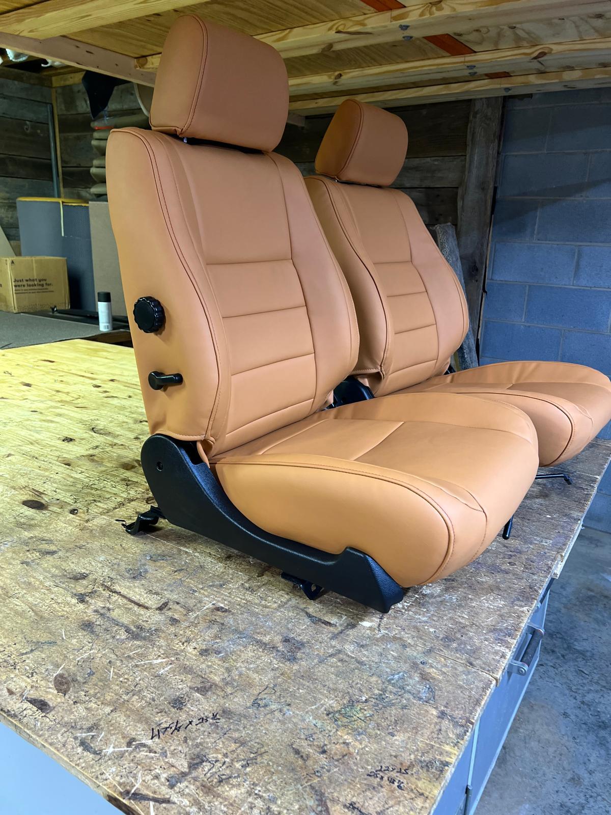 After: Bucket seats from a Toyota 4runner with supple new vinyl.