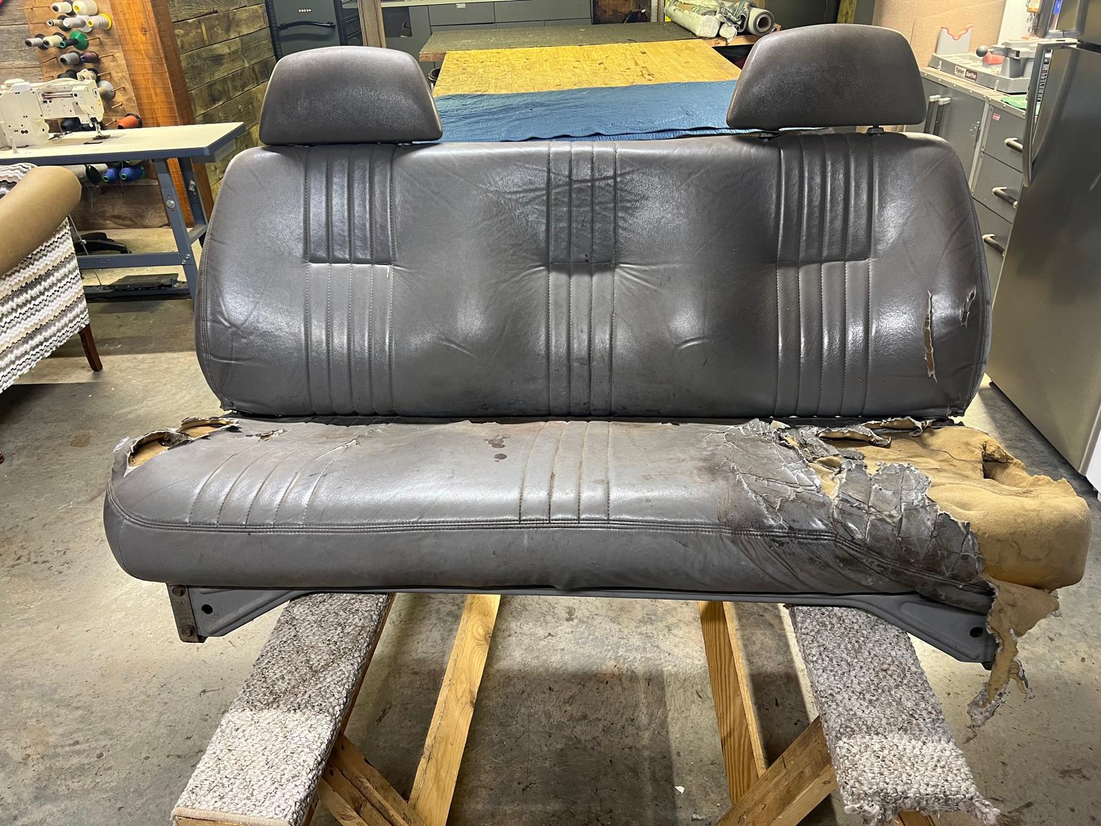 Before: A worn out bench seat from a work truck