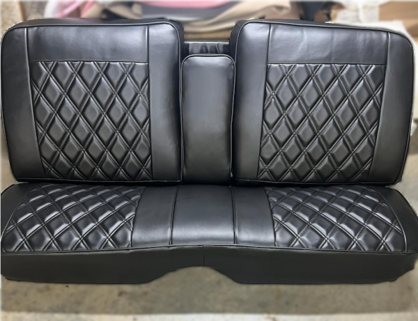 After: An impressive doublestiched diamond-pattern leather-covered vehicle bench seat.