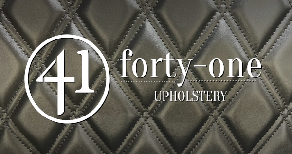 The forty-one Upholstery Logo backed by a custom double-stitched diamond leather seat pattern.