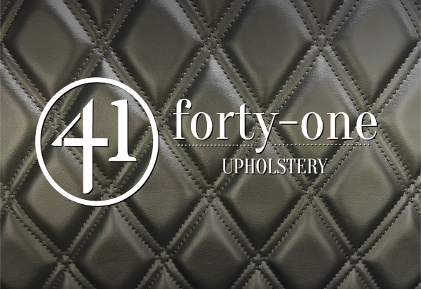 The forty-one Upholstery Logo backed by a custom double-stitched diamond leather seat pattern.